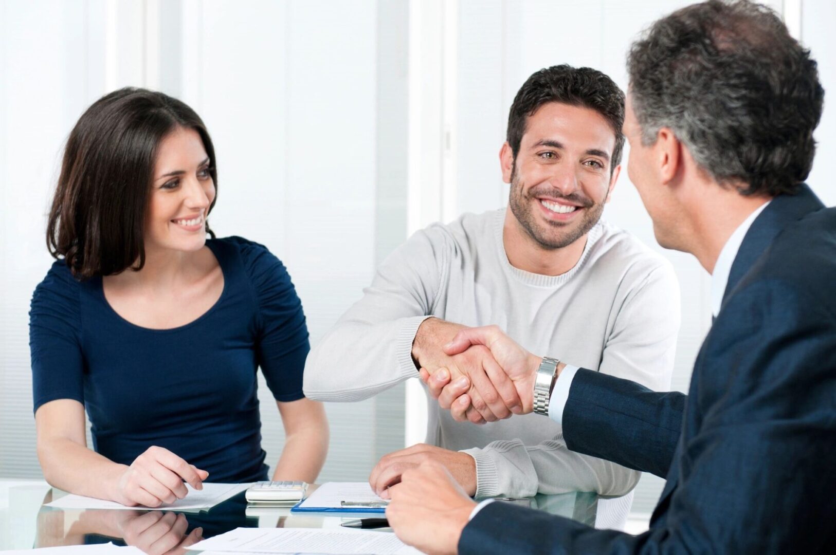 Business professionals shaking hands